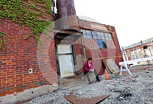 Magician at Detroit Michigan doing street magic in abandoned building at the motor city