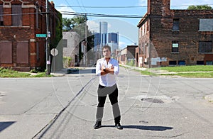 Magician at Detroit Michigan doing street magic in abandoned building at the motor city