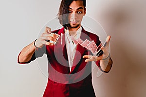 Magician doing tricks with a deck of cards