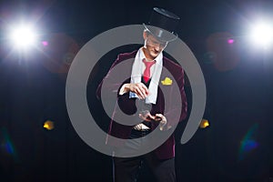 Magician, Juggler man, Funny person, Black magic, Illusion Man showing tricks with cards