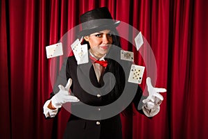 Magician with a pack of playing cards