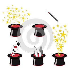 Magician`s black top hats with stardust, bunny ears and playing cards.