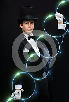 Magician showing trick with linking rings