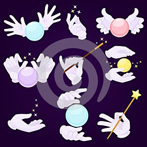 Magicians hands in white gloves with magic ball and wand