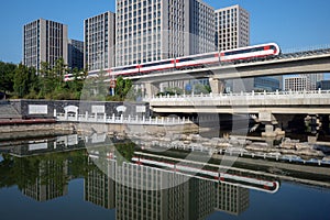 Maglev train snd building with reflection