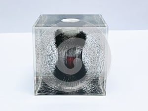 Magnet with iron dust in a cube