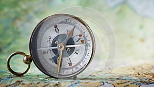 Magnetic compass on world map.Travel, geography, navigation, tou