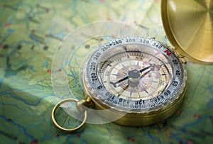 Magnetic compass on world map.Travel, geography, navigation, tourism and exploration concept background. Macro photo. Very