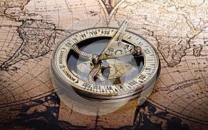 Magnetic compass on world map. Travel, geography, navigation, tourism and exploration concept background. Macro photo. Very