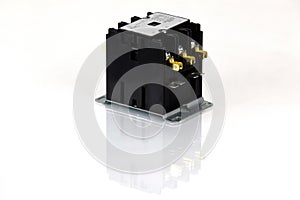 Magnetic contactor on white background.