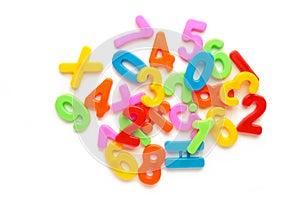 Magnetic multi-coloured figures isolated on a white background. Back to school