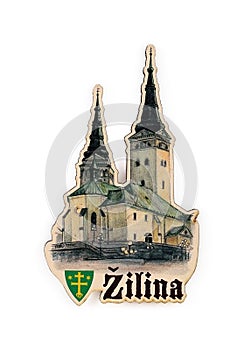 Magnetic souvenir from Slovakia with the image of the main cathedral in the city of Zilina and the emblem of the city  isolated on