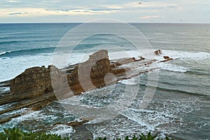 Magnific big rock in ocean