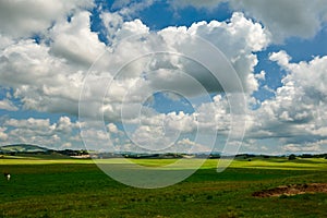 The magnificent cloudscape upon the summmer prairie