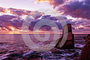 Magnificent colorful summer sunrise at Palikari rocks, Sozopol Oldtown, Bulgaria