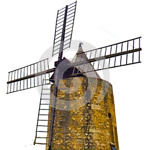 Magnificent Daudet mill. Old stone windmill isolated on white background photo