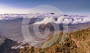 Magnificent mount Bromo landscape and Semeru peak high resolution image with clouds background