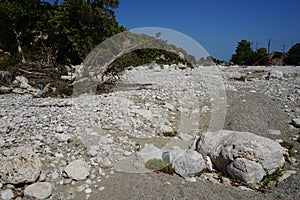 Magnificent mountainous landscape in the vicinity of the parched riverbed of the Loutani river. Kolympia, Rhodes