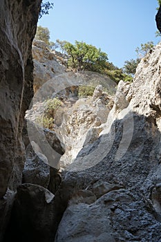 Magnificent mountainous landscape in the vicinity of the parched riverbed of the Loutani river. Kolympia, Rhodes, Greece