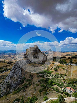 Magnificent Mussomeli Castle on a hill, overlooking the beautiful valley below. Italy.