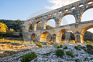 The magnificent Pont du Gard, at setting sun., ancient Roman aqueduct bridge. Photography taken in Provence, southern France