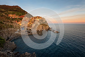 Magnificent sunset view of the Manarola village. Manarola is one of the five famous villages in Cinque Terre Five lands