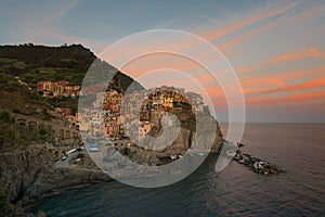 Magnificent sunset view of the Manarola village. Manarola is one of the five famous villages in Cinque Terre Five lands National