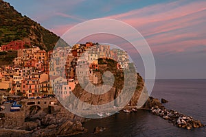 Magnificent sunset view of the Manarola village. Manarola is one of the five famous villages in Cinque Terre Five lands National