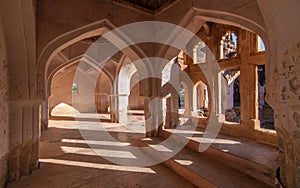 Symmetric arched corridors photo