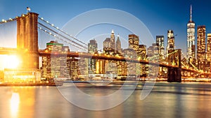 a magnificent view of the lower Manhattan and Brooklyn Bridge with sunset, New York City