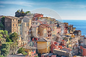 Magnificent daily view of the Manarola village in a sunny summer day. Manarola is one of the five famous villages in Cinque Terre