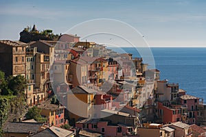 Magnificent daily view of the Manarola village in a sunny summer day. Manarola is one of the five famous villages in Cinque Terre