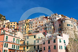 Magnificent daily view of the Manarola village in a sunny summer day. Manarola is one of the five famous villages in Cinque Terre