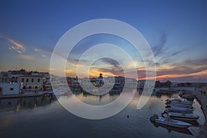 Magnificent view of old port of Retimno, Crete, Greece during a beautiful sunset in the Mediterranean