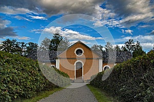 Magnificent View Of An Old Swedish Church and its majestic garden