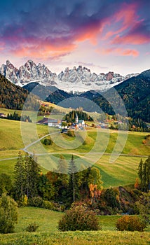 Magnificent view of Santa Maddalena village in front of the Geisler or Odle Dolomites Group. Colorful autumn sunset in Dolomite Al