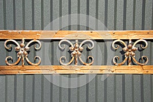 Magnificent wrought-iron gates, ornamental forging, forged elements close-up
