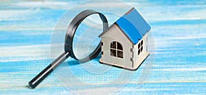 magnifier and house. home search concept. home inspection