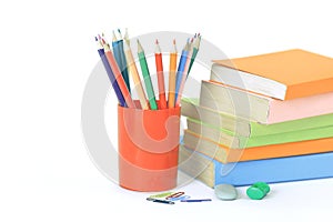 Magnifier, paper clip and school supplies on white background .photo with copy space