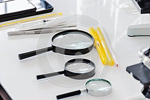 Magnifiers, thermometer in scientific laboratories photo