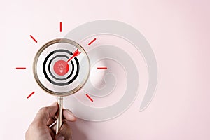 Magnifying glass aiming objective dart board target with arrow and idea creative light bulb icon. Business goal to success
