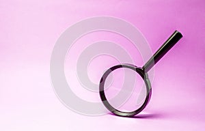 Magnifying glass on blue background. Concept of search