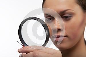 Magnifying glass and brush photo