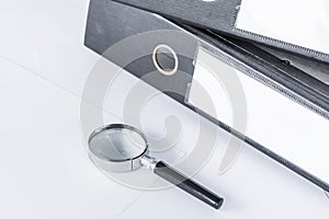 Magnifying glass and document files