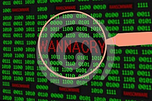 Magnifying glass enlarging wannacry in computer machine code