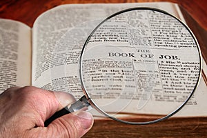 Magnifying Glass on Famous Bible Chapter of Job