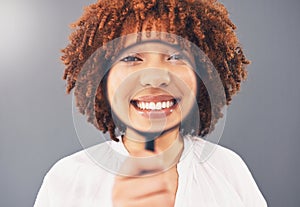 Magnifying glass, focus and smile with portrait of black woman for analysis, exploration and close up. Detective, search