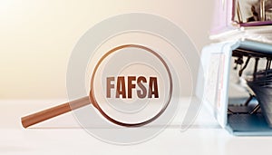Magnifying Glass With the Word FAFSA photo