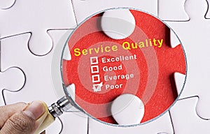 Magnifying glass focusing on Poor evaluation of Service Quality