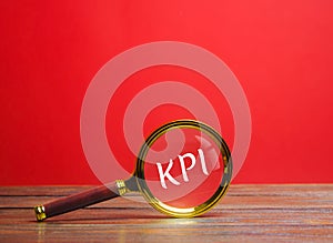 Magnifying glass with the inscription KPI. Key Performance Indicator. Planning and implementing a business strategy. Control of